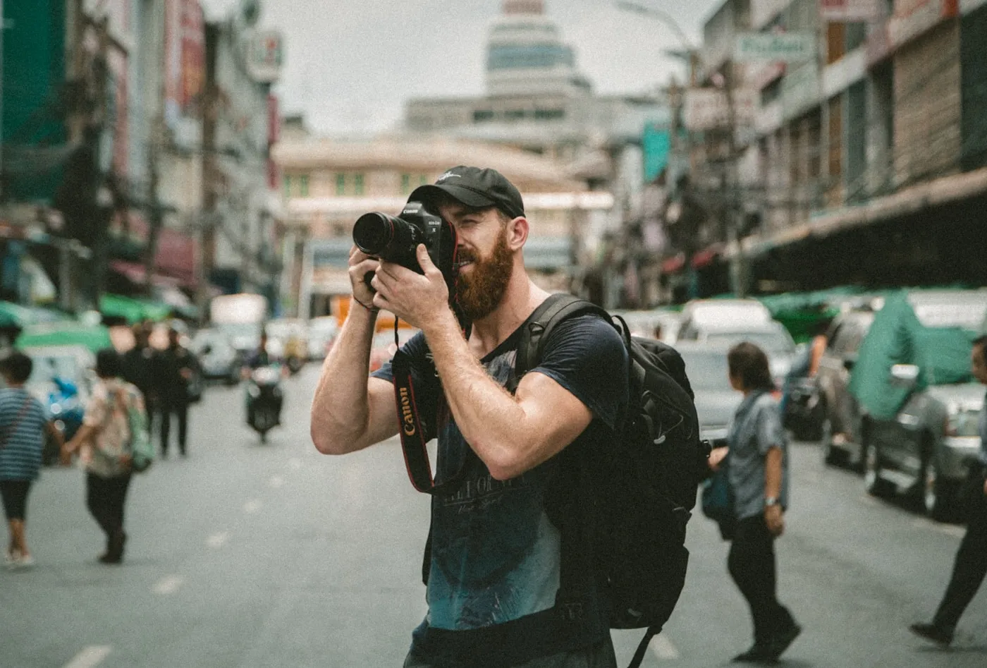 Travel photographer documenting a city experience