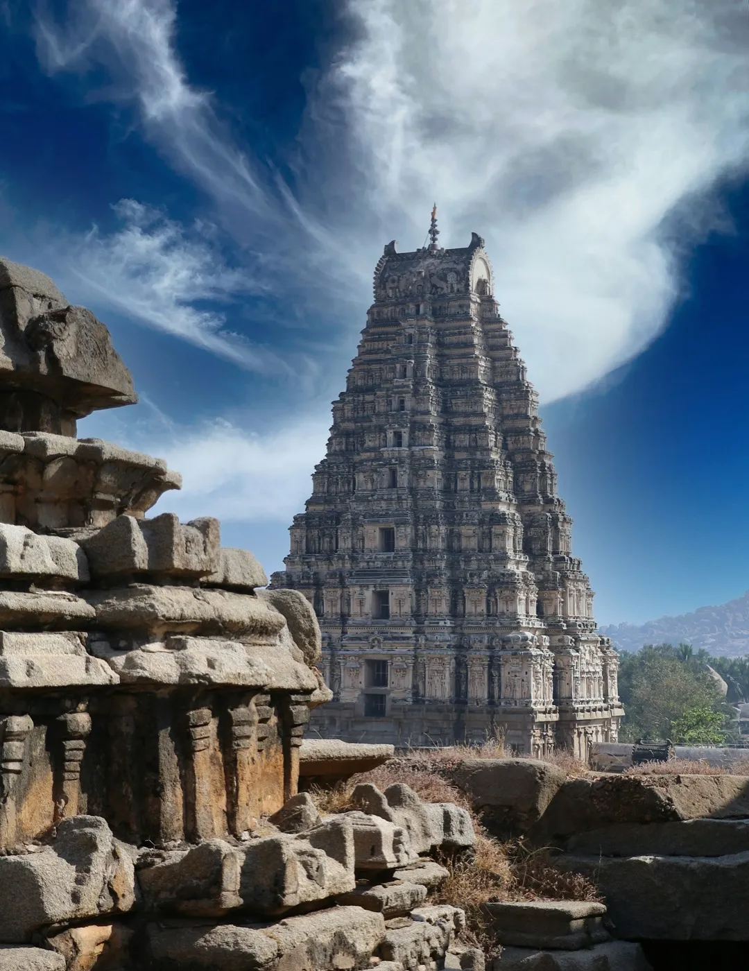 Historic stone temple tower at Hampi